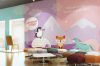 In-store design for American Kids with character murals on the wall portrayinng a fox, penguin & unicorn in the United Lands of ArK